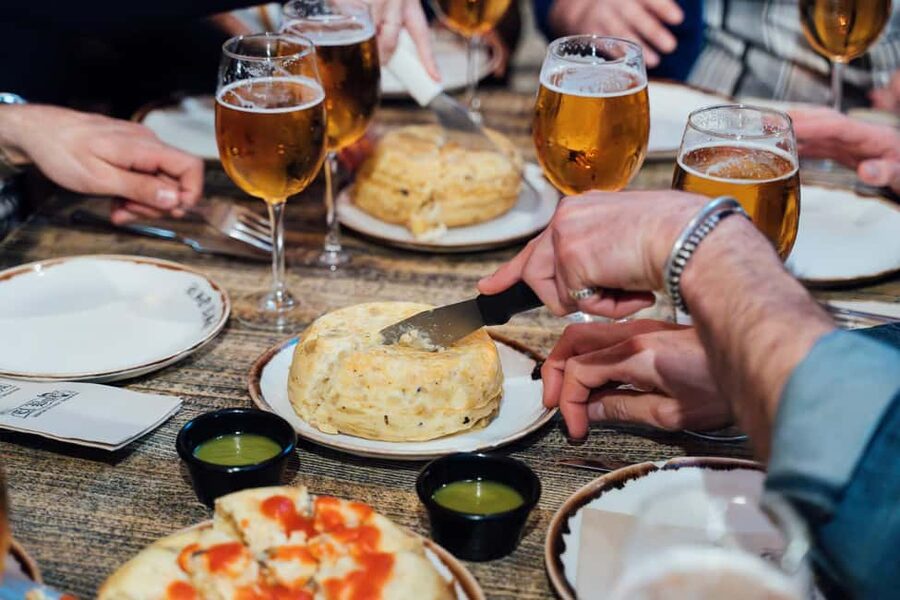 Madrid Guided Food Tour with Tapas and Spanish Wine - La Latina neighborhood walk: where tapas culture actually lives