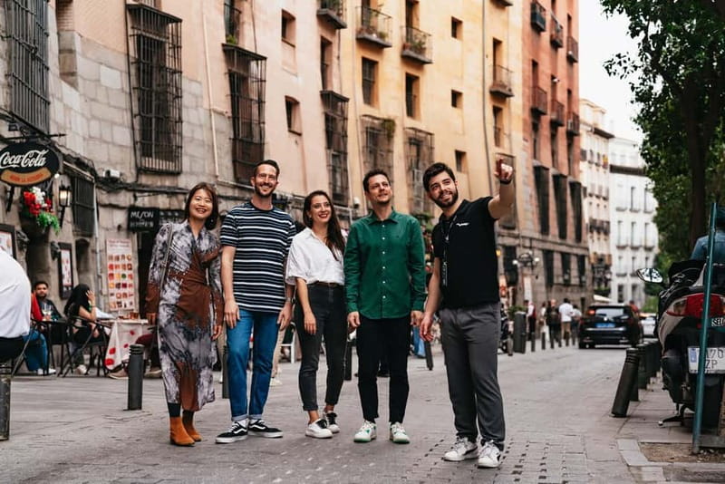 Madrid: Guided Tapas and Wine Tour with Rooftop Views - Carrilleras at a Casa de Comidas: Wine Pairing and Market-Time Stops