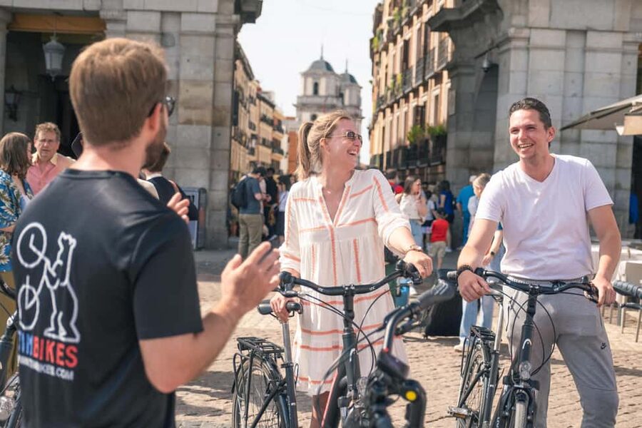 Madrid: Highlights Bike Tour with Optional E-Bike or Tapas - Plaza Mayor to Plaza de Santa Ana: two squares, two moods