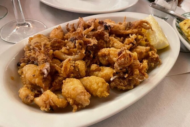 Madrid LGBTQ Tapas Tour - Stop 4: Calle de Hortaleza market stop for everyday bites