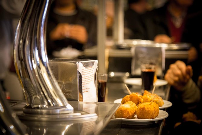 Madrid Local's Tapas Tour Dinner with a side of History - Stop 1: Calle de Preciados croquettes since 1860