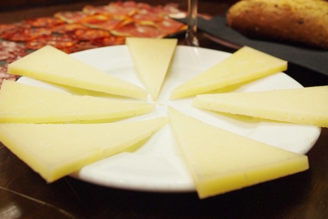 Madrid Local's Wine and Tapas Lunch Tour with a side of History - The Guide Makes It: History Without the Lecture