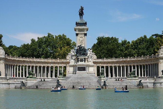 Madrid Royal Palace & Retiro Park Tour with Optional Tapas - How the tour transitions to the Royal Palace at Plaza de Isabel II