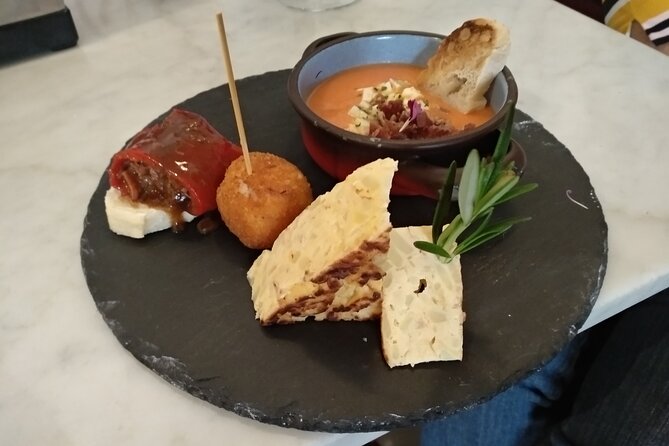 Madrid Small Group Tapas Tour at 4 Venues -Lunch or Dinner - A “famous food court” stop and the pleasure of stopping often