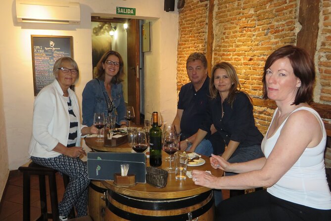 Madrid Small Group Tapas Tour at 4 Venues -Lunch or Dinner - Royal Palace neighborhood: where views and wine pair naturally