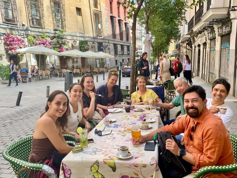 Madrid: Small Group Tour with Tapas & Drinks - Sol, quick photo stops, and how the guide helps you “get your bearings”