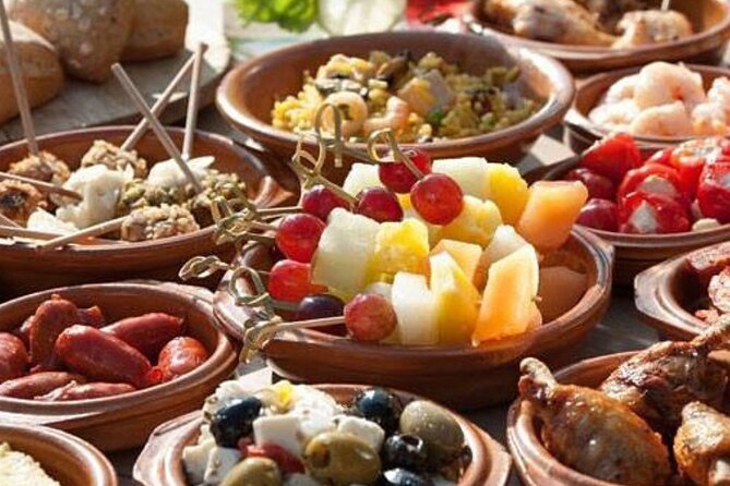 Madrid Tapas and Mysteries Walking Tour with Private Option - Pub Crawl After Tapas: Shots, Discounts, and Nightlife Entry
