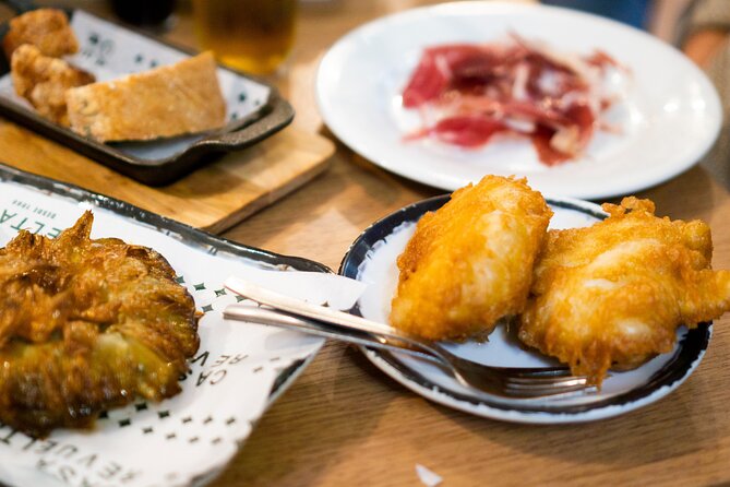 Madrid Tapas Tour with Food and Drink - Stop 2: La Latina taverns where tapas feel like a local routine