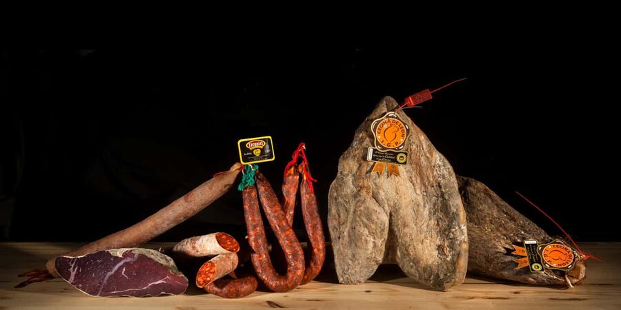 Madrid: Taste typical Spanish tapas, cold cuts, Iberian ham, and wine - Malasaña is the right stage for ham, cheese, and wine