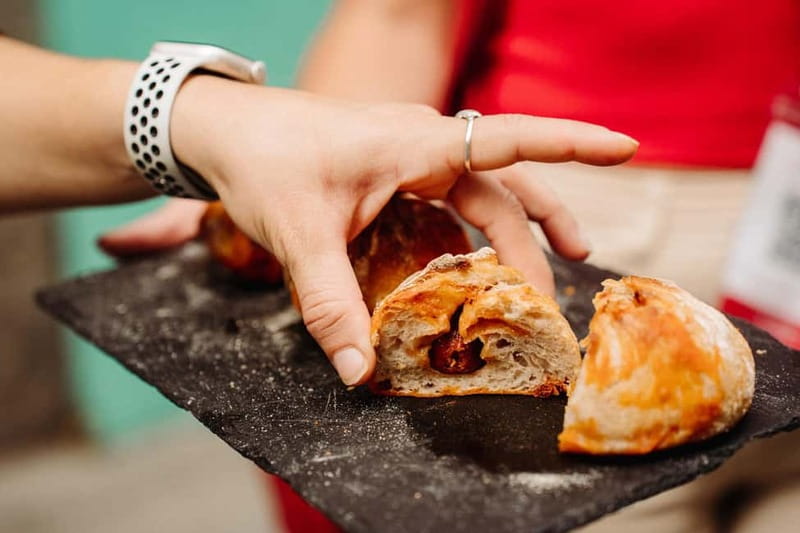 Madrid: Ultimate Food Tour of Local Markets & Tapas - MOEGA Empanadas y pan gallego: bread that proves a point