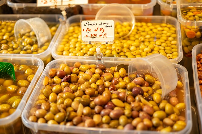 Malaga Food Tour with 12+ Tastings: Tapas, Olive Oil, Ham & More - A tight 3.5-hour walk that mixes food with real city context