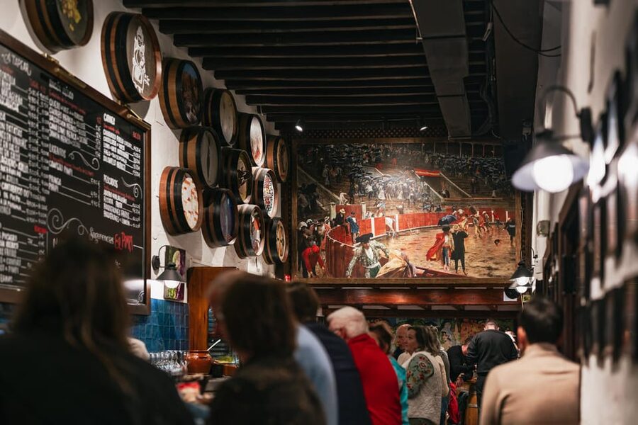 Málaga: Traditional Andalusian Tapas and Wine Tour - The First Big Stop: A Local Restaurant With Folkloric Charm