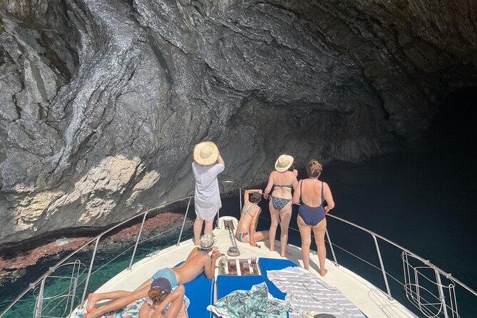 Mallorca Beach & Caves 4hr Boat Trip Drinks, Tapas, SUP & Snorkel - Coll Baix (Platja Des Coll Baix): snorkeling and paddleboarding time