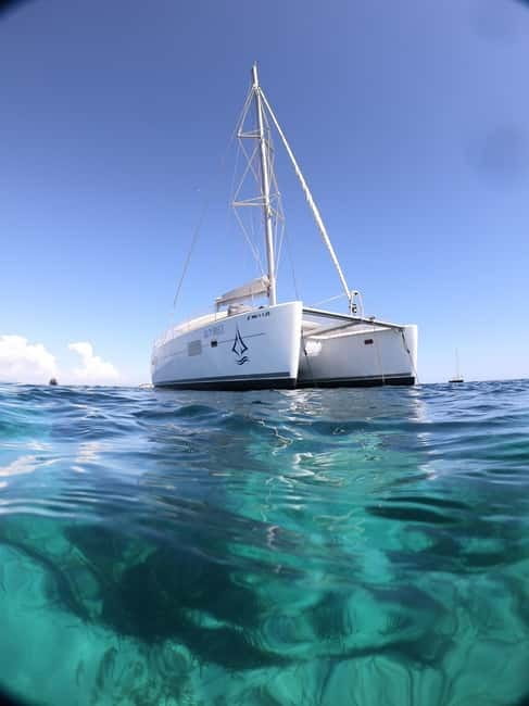 Mallorca: Catamaran Boat Tour with Tapas - The 4.5-Hour Flow: Cruising, Cliffs, Then That Swim Stop