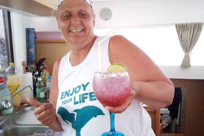 Mallorca Catamaran Small Group Cruise with Tapas 4-hours - Nadine on cocktails: a full-on bar moment at sea