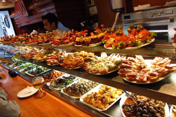 Night Tapas Walking Tour in Barcelona Modernist Area with Small Group and Dinner - Key highlights you’ll feel right away