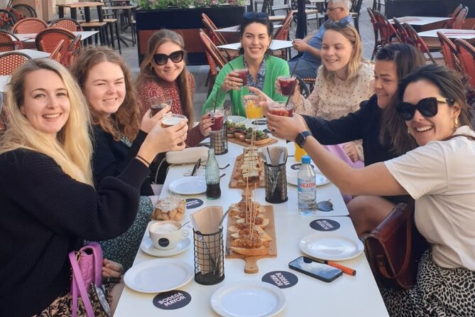 Palma de Mallorca Bike Tour with tapas - City Hall, an Olive Tree, and the Streets That Feel Like Palma