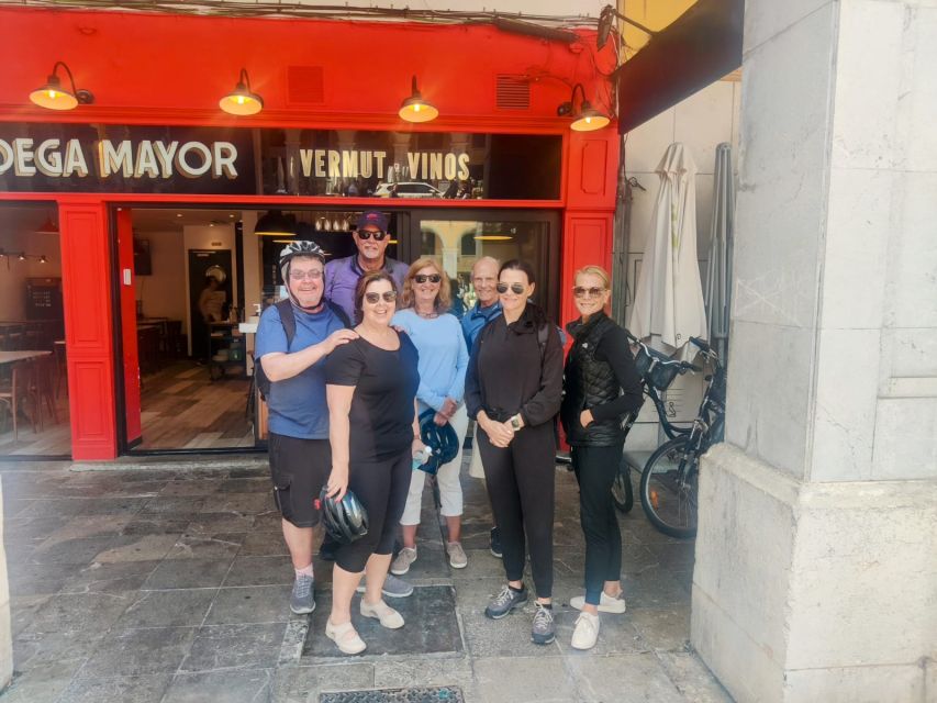 Palma de Mallorca: Guided Bicycle Tour with Tapas & a Drink - Riding Palma’s seafront toward La Seu and Parc de la Mar