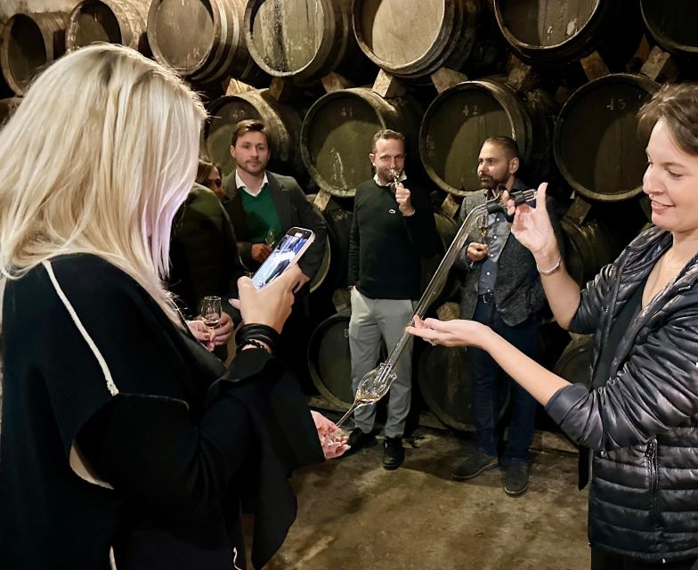 Palma: Distillery Tour with 3 Spirits and Tapas Tasting - Walking into Palma’s underground cellar world
