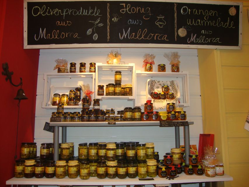 Palma Tour with Wine and Tapas Tasting - Tapas with ham, cheese, and a typical Majorcan bar stop