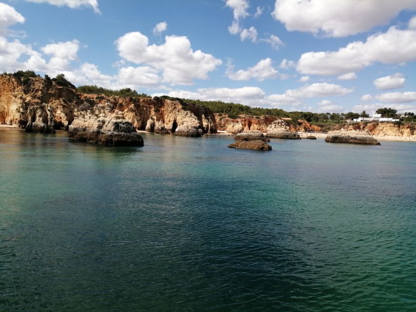 ponta da piedade 2h luxury charter with drinks and tapas - Praia da Batata and Bandeira Fort: the beach with a built-in backdrop