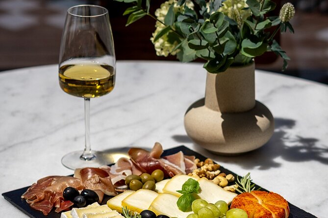 Porto Wine Tasting Experience with Portuguese Tapas Plate - How the Tasting Is Presented: A Relaxed, Guided Flow