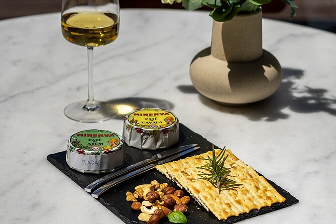 Porto Wine Tasting Experience with Portuguese Tapas Plate - The Food Pairing: Cheese, Portuguese Cured Ham, Crackers, and Homemade Jam