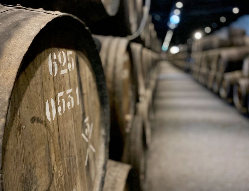 Porto: Wine Tasting with Tapas Walking Tour - Tapas and pairings at the local restaurant: codfish cakes and Vinho Verde