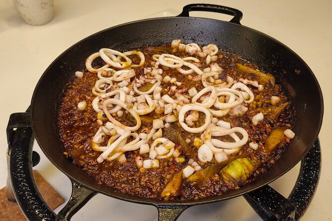 Premium Cooking Class in Designer Loft: Paella & Spanish Tapas - Hands-on cooking at your pace: tapas, paella, and dessert stations