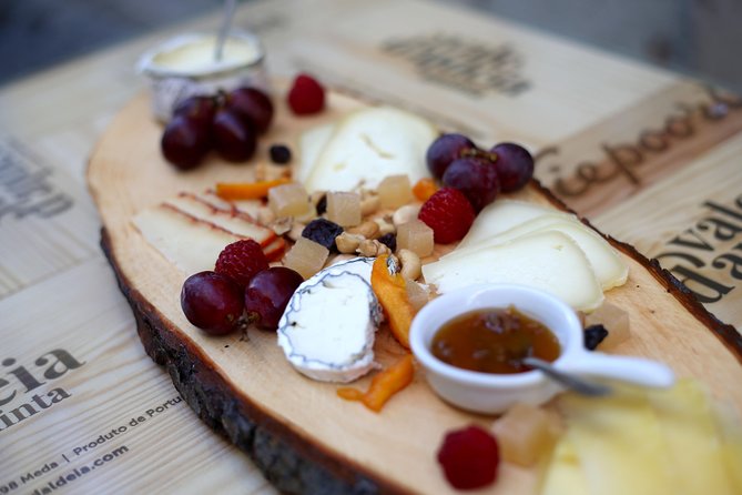 Premium Lisbon Wine and Tapas Tasting - What You’ll Taste: 5 Wines, Olive Oil, Cheeses, Pork, and Pata Negra