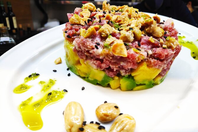 PREMIUM TAPAS TOUR: Paella, Market Tastings, and Winery - Mercado Central de Atarazanas: see the stalls, then taste what matters