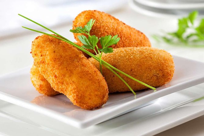 PREMIUM TAPAS TOUR: Tapas, Paella and Winery - What you’ll walk past: old-city context without turning it into a lecture