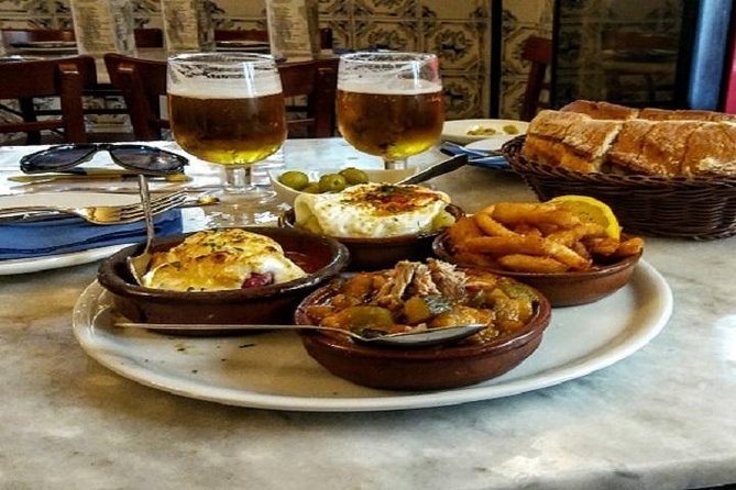 Private Tapas Tour (Only your group will participate) - Puerta del Sol: history on the square you walk from