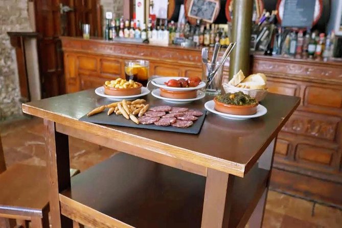Sevilla Food Tour: Tapas, Wine, History & Traditions - Alfalfa’s tavern stop: tostas, montaditos, and regional wines