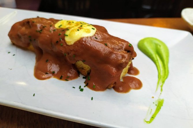 Sevilla Food Tour: Tapas, Wine, History & Traditions - Los Soportales for chicharrones, montaíto, and beer from the barrel