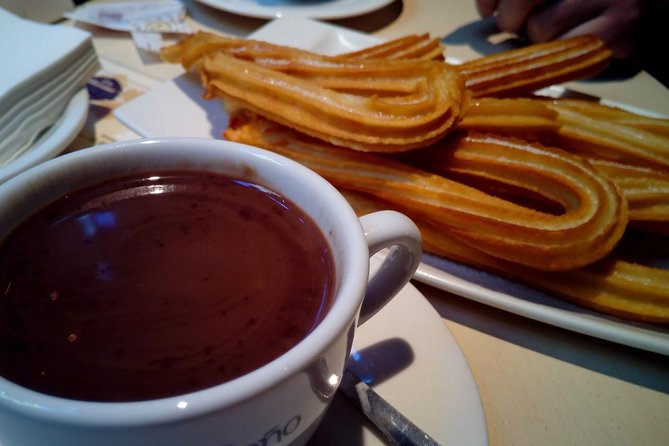 Seville Food Tour: Tapas, Drinks and Delights with a Local - Stop 3 at the Torre Giralda Area: Jamón Ibérico and Queso Tasting