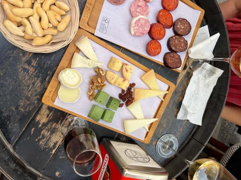 Seville: Secret Food Tour with Tapas and Drinks - Triana neighborhood tastings: 1.5 hours of tapas + wine pairing