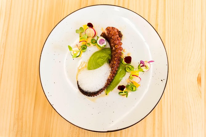 Seville Wine & Gourmet Tapas Tour by Food Lover Tour - Stop 3: an exclusive Seville restaurant with a paired degustation dinner