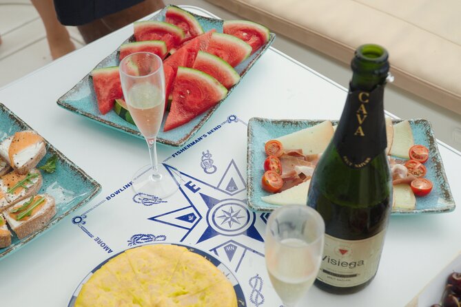 Shared Luxury Yacht Cruise with Champagne and Tapas - Food and drinks on deck: Tapas that actually fill you up