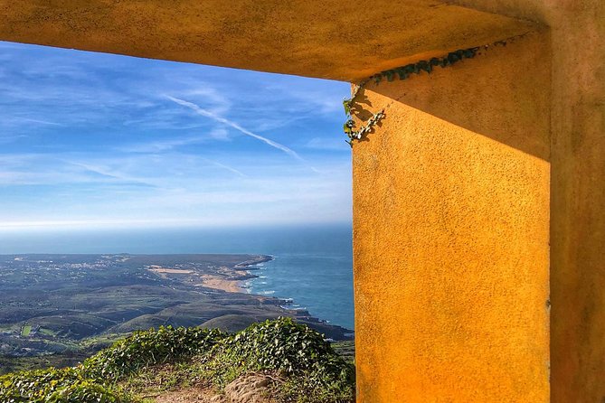 Sintra Cascais (Wine and Tapas) 4X4 Land Rover Panoramic Private Tour - Sintra National Palace: the famous chimneys and a style mash-up
