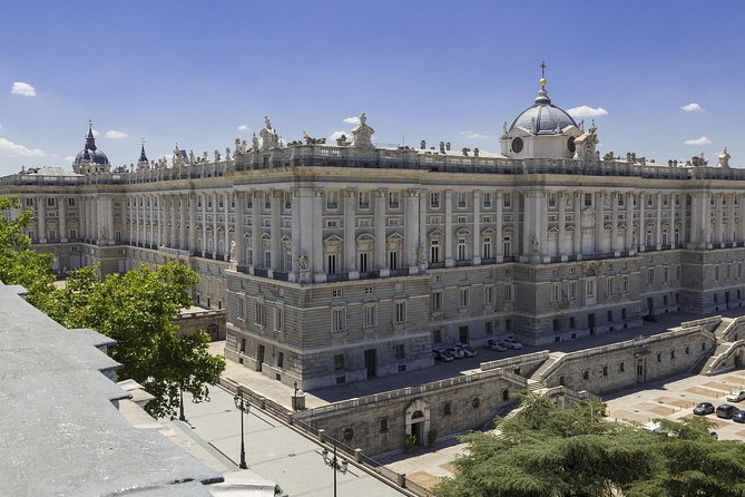 Skip-the-line Madrid Royal Palace with tapas tasting & Retiro Park - Plaza de Isabel II: a quick square stop before the palace