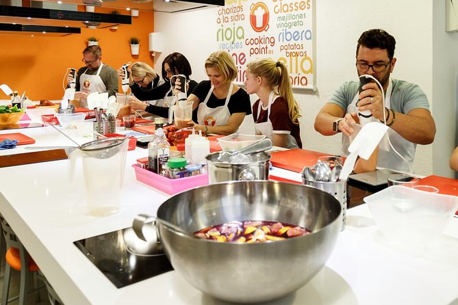 Spanish Cooking Class Paella Tapas and Sangria in Madrid - Meet your chef and feel the pace of a real kitchen