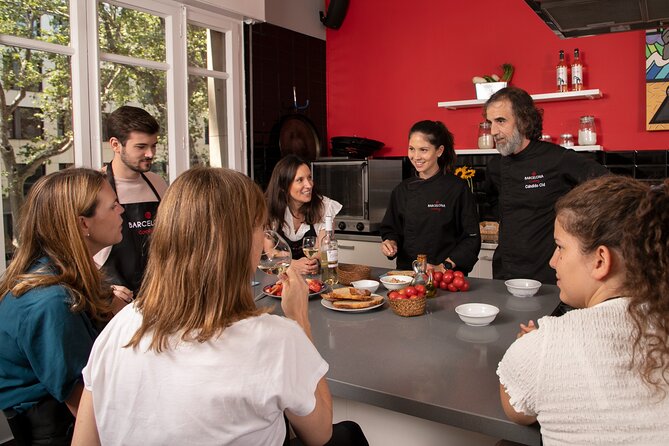 Spanish Tapas Workshop: Boqueria Tour & Rambla Views - The Four-Course Meal and Unlimited Wine Views Toward Las Ramblas