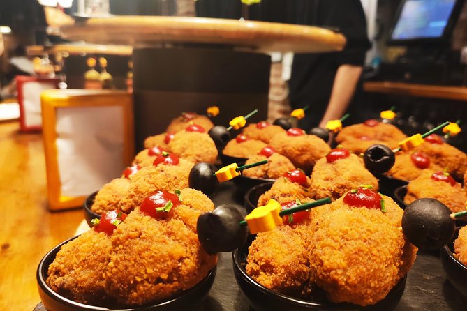 Spanish Wine and Tapas Tour in a Local Neighborhood in Barcelona - Stop-by-stop experience: what each bar moment is actually for