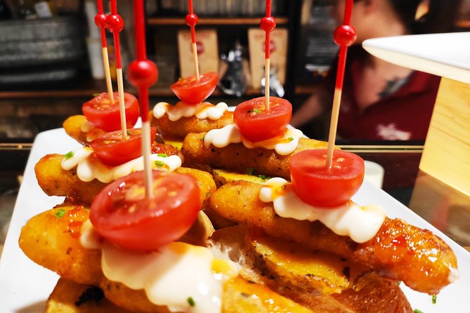 Spanish Wine and Tapas Tour in a Local Neighborhood in Barcelona - What makes the wine tastings feel worth it