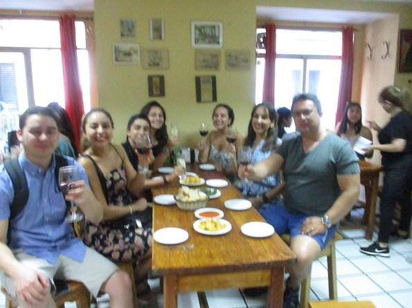 Tapas and history tour ending with churros with chocolate - Puerta del Sol symbols, then onward to Plaza Mayor