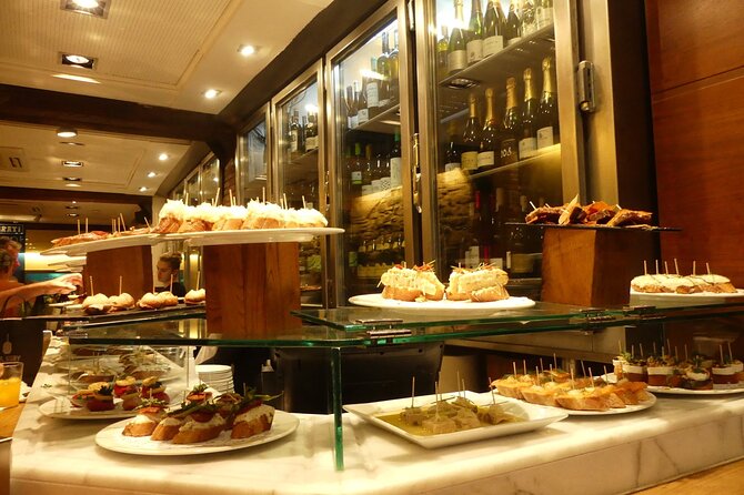 Tapas and Wine Walking Tour in Barcelona - Stop 1: Barri Gòtic (Gothic Quarter) with medieval streets and bite-sized stories