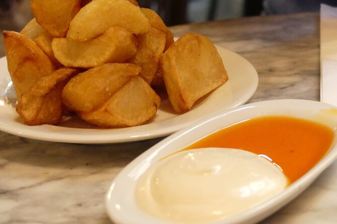 Tapas and Wine Walking Tour in Barcelona - Stop 2: El Raval—culture, street energy, and food with a point