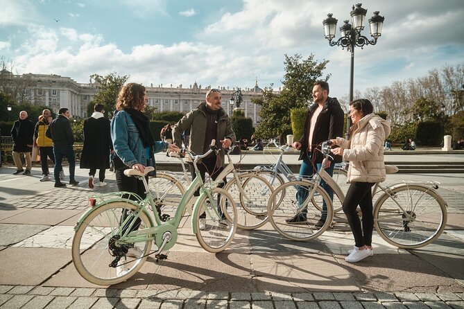 Tapas & Guided tour on a Vintage Bike through Madrid - Puerta de Alcalá and Puerta del Sol: Arches, Statues, and the Bear-and-Tree