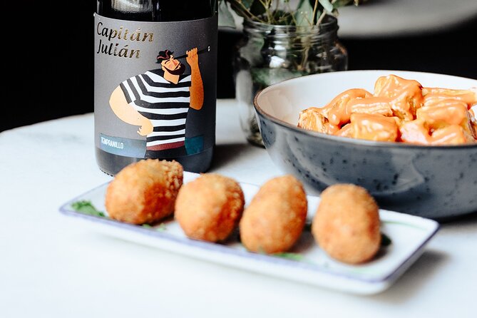 Tapas & Paella Experience | 3 Local places | Meet Travelers - Stop 2: Two traditional tapas that mix land-and-sea ideas